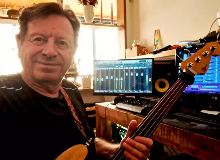 Groove builder, arranger, producer, fretless bass player