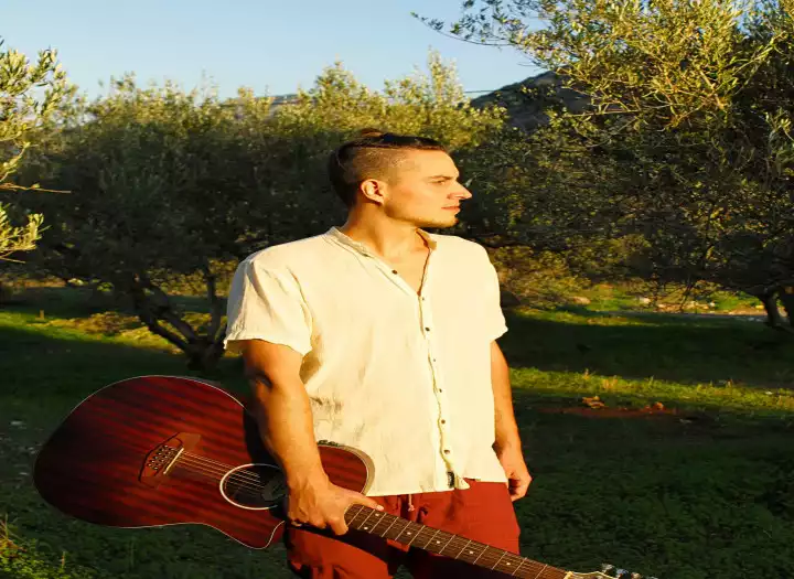 Acoustic guitar - writing or recording