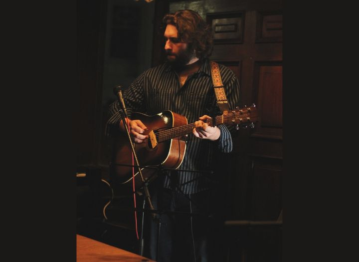 I will record professional acoustic guitar tracks for your song