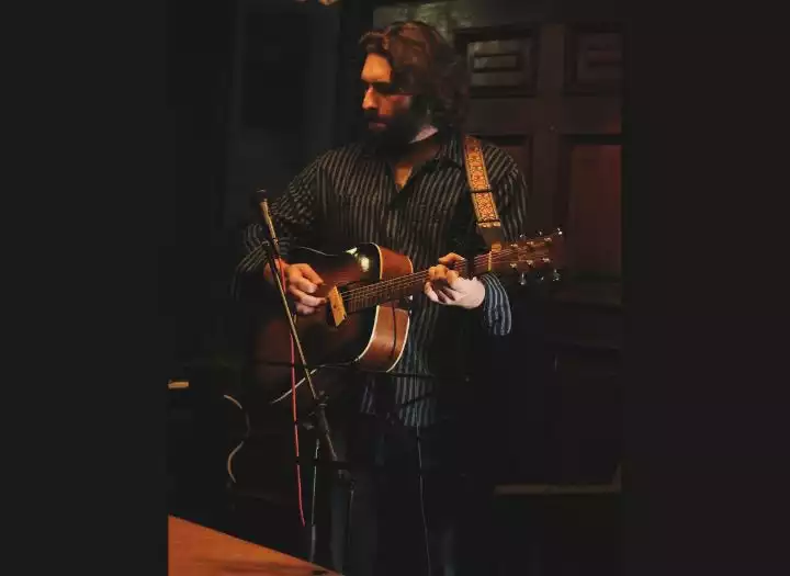 I will record professional acoustic guitar tracks for your song