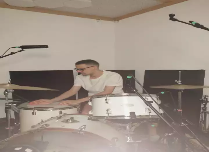 I will record professional live drums for your song